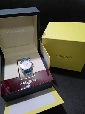 Longines Silver Dial Stainless Steel Watch with Blue Accents
